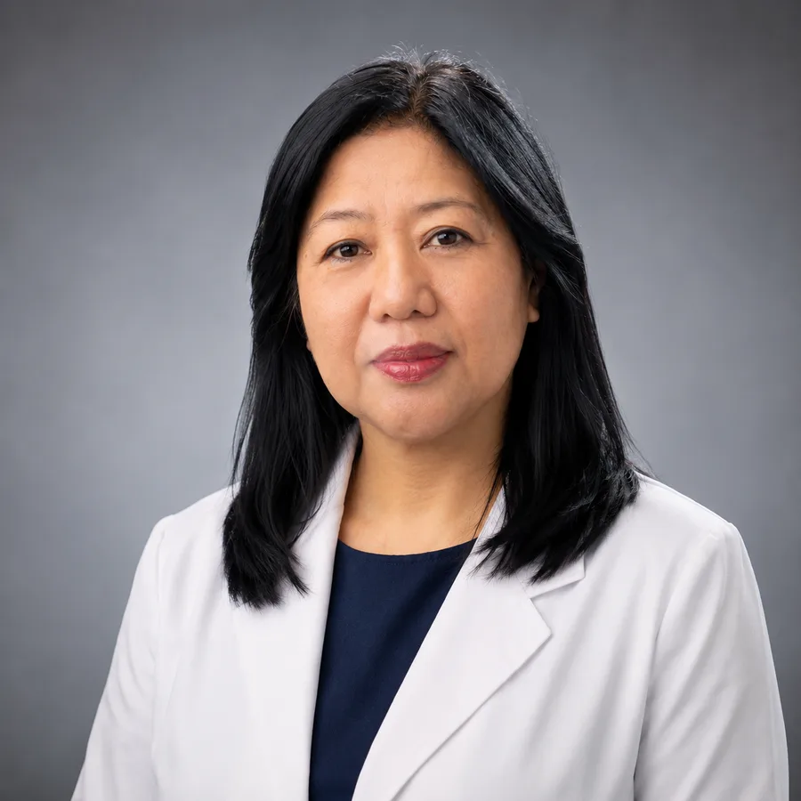 Dr. Leila Marsha Peterson, DC in a white coat
